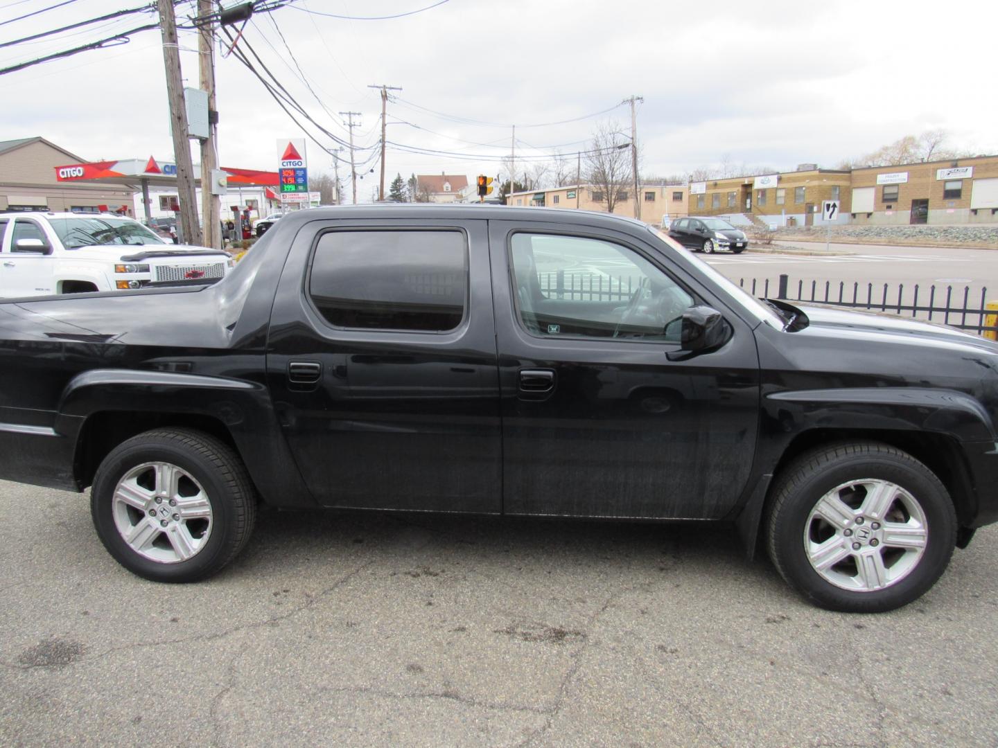 2012 BLACK /Gray Honda Ridgeline RTL (5FPYK1F56CB) , Automatic transmission, located at 215 Milton St, Dedham, MA, 02026, (781) 329-5144, 42.241905, -71.157295 - This nice Ridgeline is in excellent condition. Runs like new. All ASPI Motor Cars vehicles are fully serviced before they are delivered to assure the highest quality used vehicles. Comes with a 3/3 warranty included in the price. call for details. Prices on all vehicles do not include $299.95 Doc - Photo#5